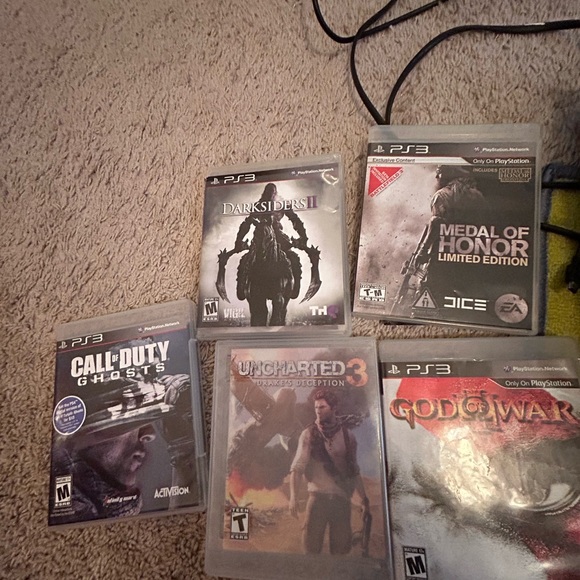 PlayStation 3 and Elements TV BUNDLED with games and two controllers.